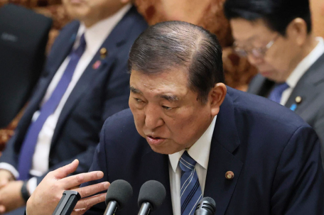 日本首相对特朗普关税发出强烈警告